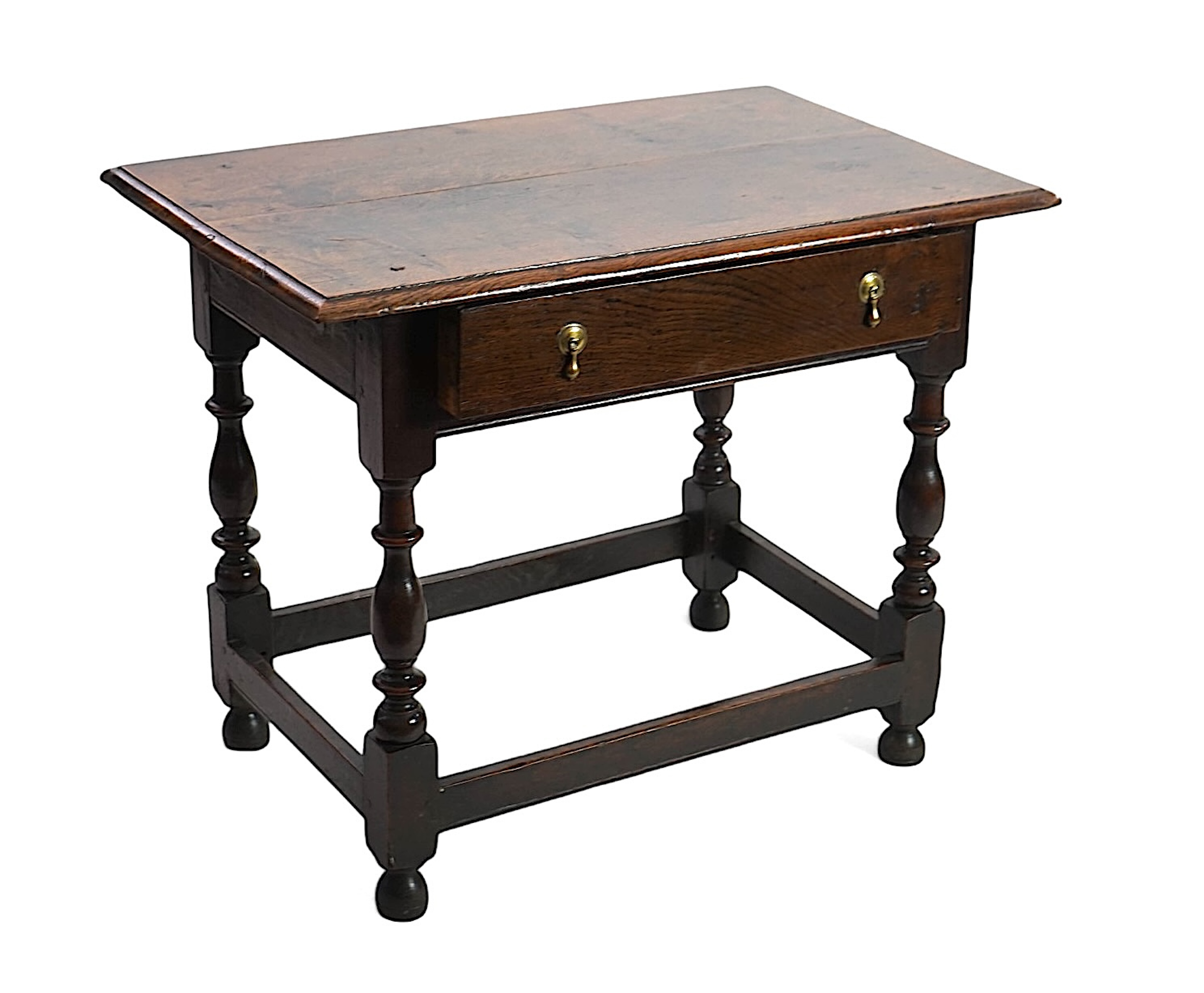 An early 18th century and later oak side table